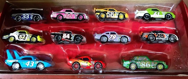 Cars (Auta) - 11pack DOT-COM - King, Chick Hicks, Lightning McQueen...